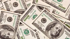 Тенге укрепился на 1,2 тенге перед выходными на KASE