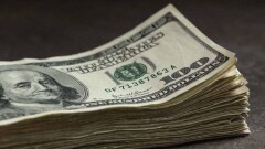 Доллар подешевел на бирже до 377 тенге