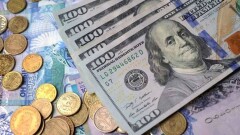 Снижение курса тенге Нацбанк связал с оттоком портфельных инвестиций из Казахстана