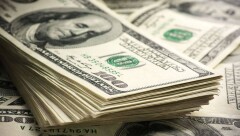 Курс доллара на бирже достиг рекордных 386,47 тенге