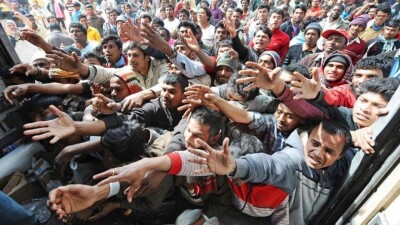 Около 300 000 беженцев из Сирии и Ирака могут въехать в этом году в Германию