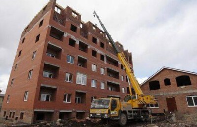 Два жилых комплекса, построенных на деньги дольщиков, снесут в Астане 