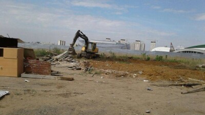 Обклеенный портретами Назарбаева дом окончательно сровняли с землёй в Астане