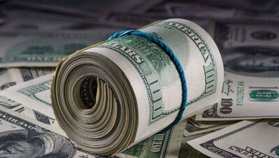 Доллар подешевел на бирже до 324 тенге