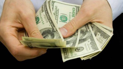 Курс доллара опустился ниже отметки в 402 тенге перед выходными