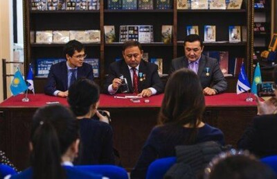 Марку с космонавтом Айдыном Аимбетовым выпустила "Казпочта"