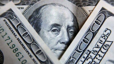 Курс доллара на выходные: 334,4 тенге за доллар