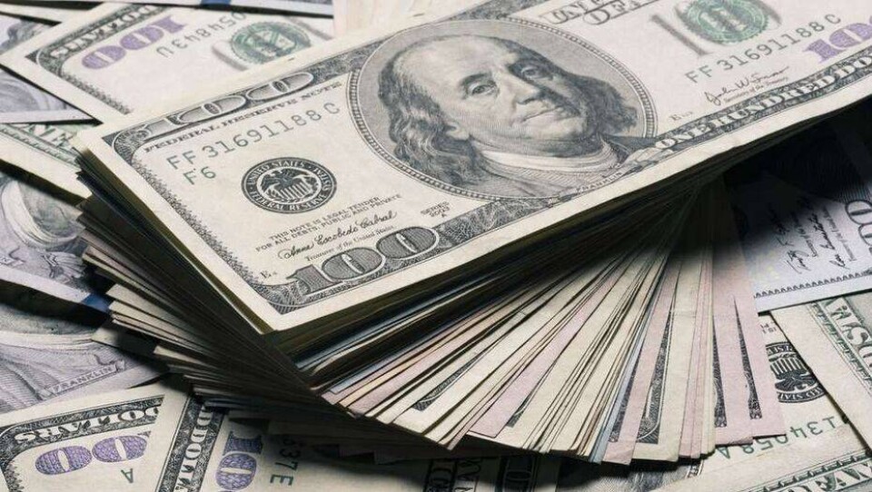 Курс доллара упал на бирже до 397 тенге на фоне растущих цен на нефть