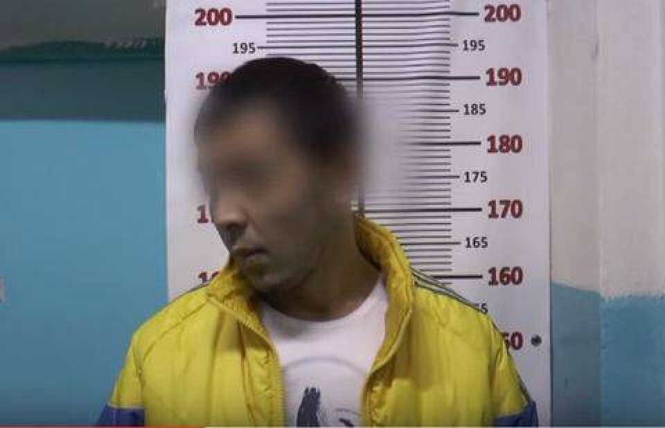 Кадр видео допроса подозреваемого, ДВД Алматы