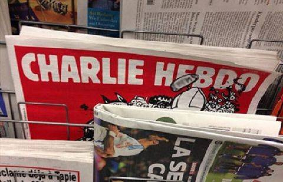 Злобного бога с автоматом изобразили на обложке Charlie Hebdo