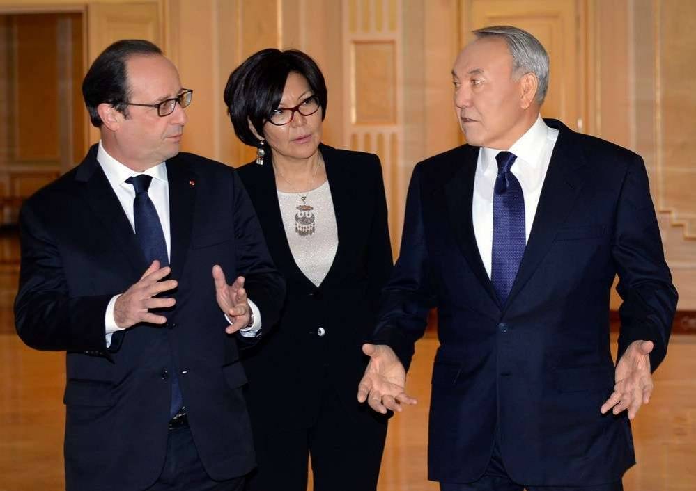 Франсуа Олланд (бывший президент Франции), Айгуль Куспан и Нурсултан Назарбаев во время встречи в 2014 году