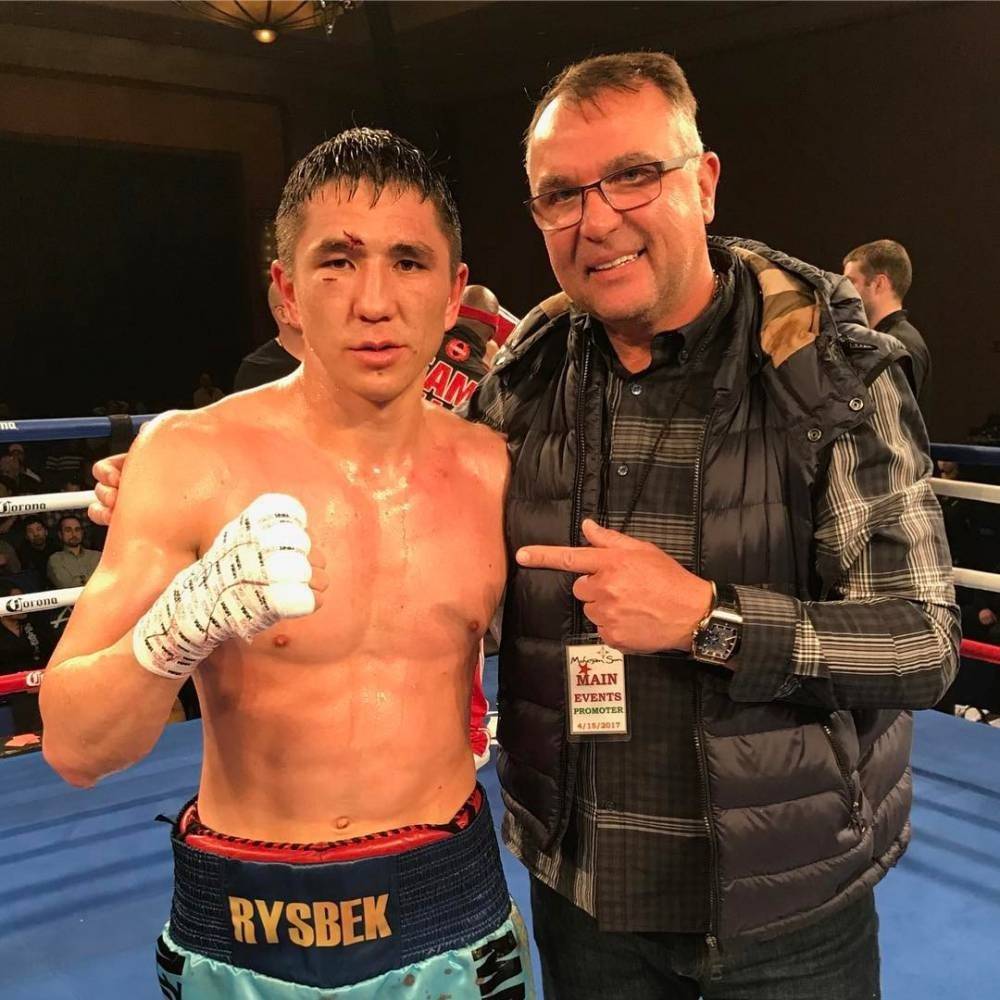 Мадияр Ашкеев с менеджером Эгисом Климасом